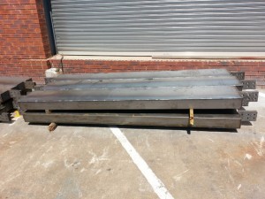 Blasted and coated structural steel section